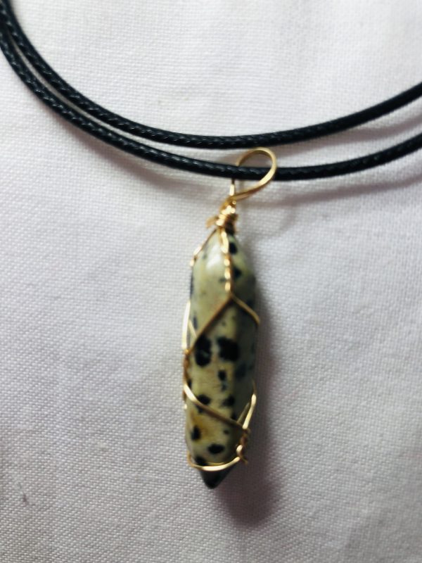 WIRE WRAPPED DALMATIAN JASPER PENDANT.